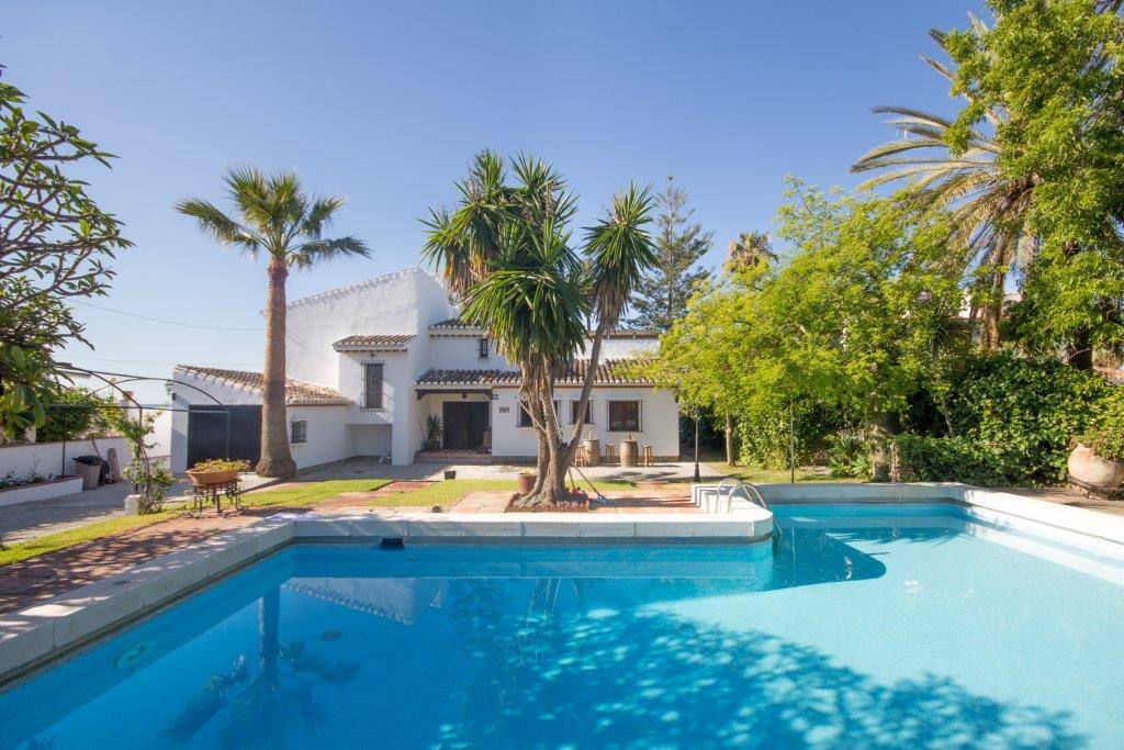 Pool with villa