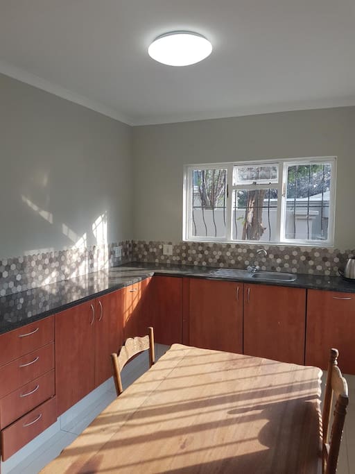 Newly renovated large Kitchen with loads of sun and lots of cupboard space.