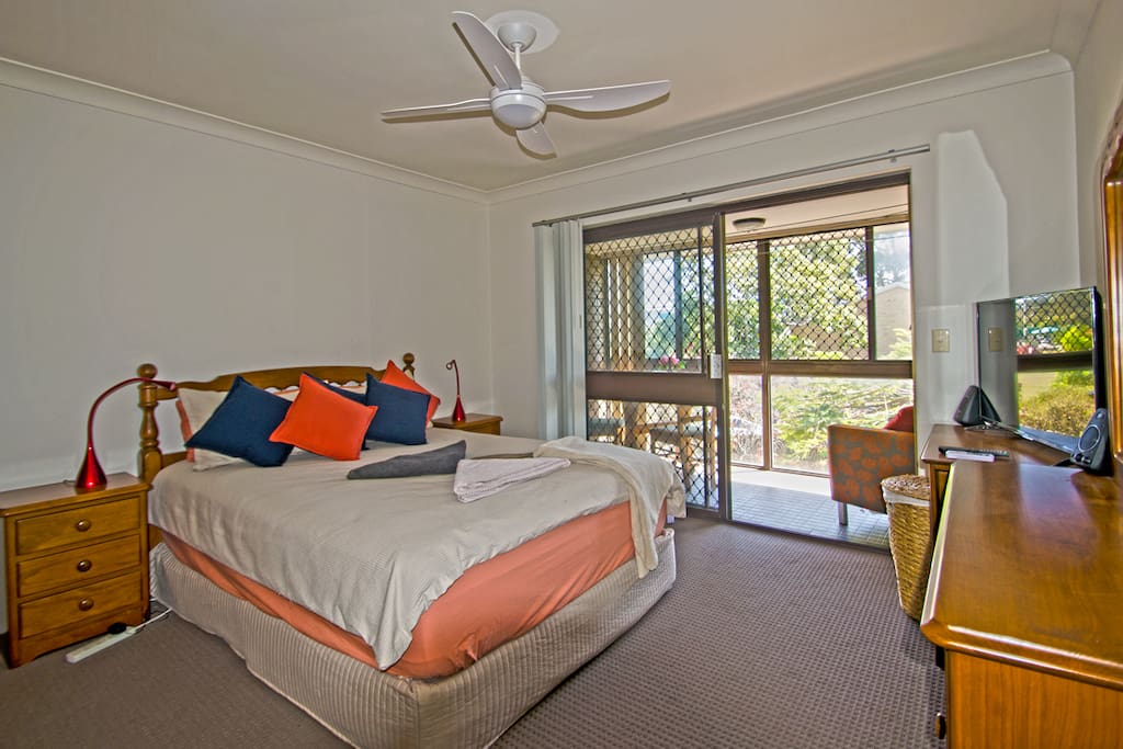 Master bedroom relax in super comfortable Queens size bed with HD TV and your private balcony