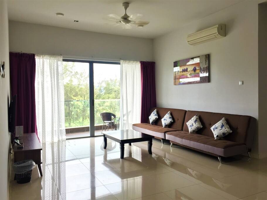 Living area w/ two super single sofa bed
