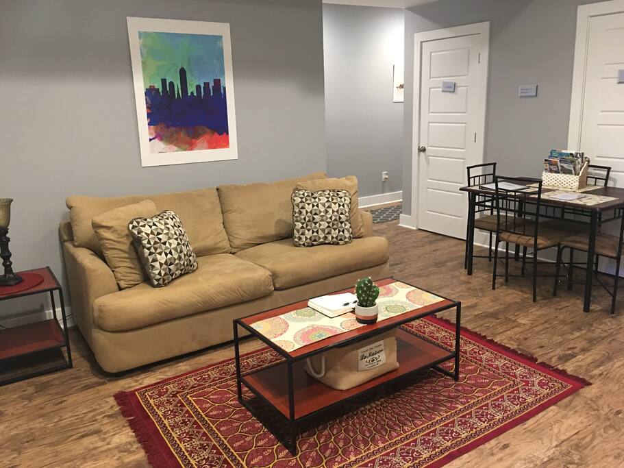 Cozy couch for relaxing- doubles as the 3rd bed.