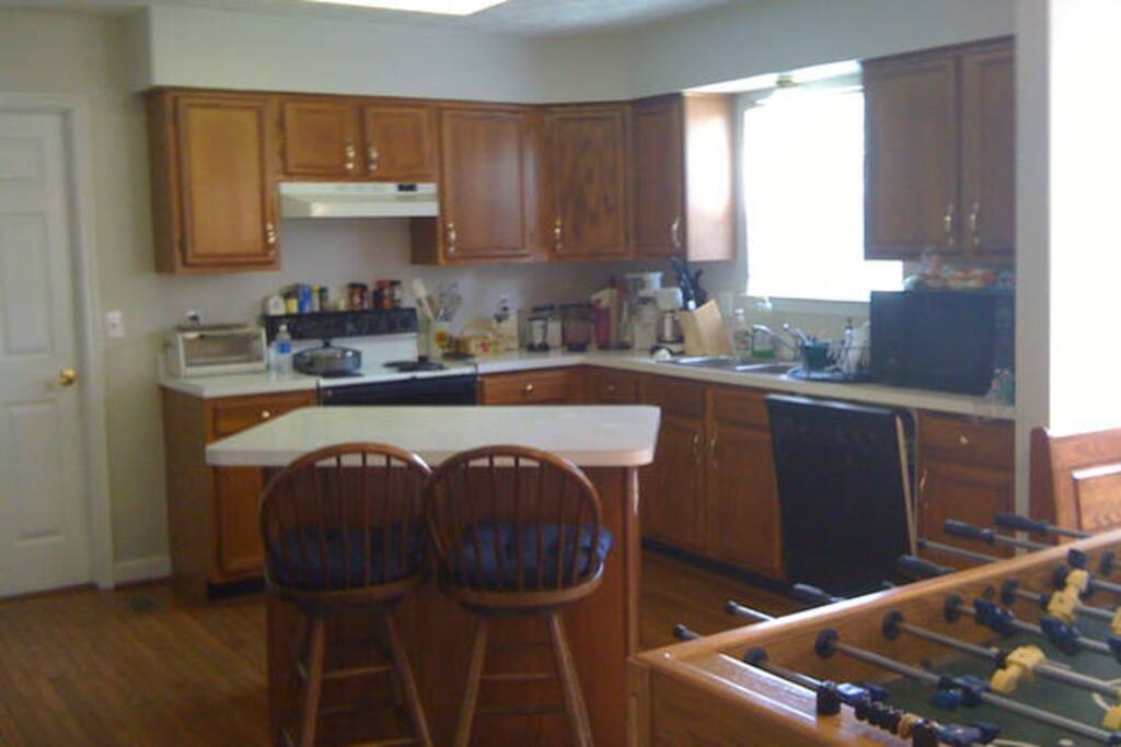 Welcoming open kitchen with all amenities.