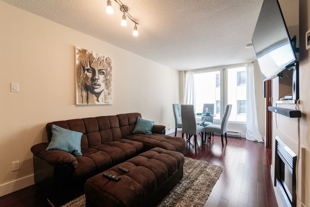 48' TV with sound bar and Chromecast. Queen size sofa-bed.