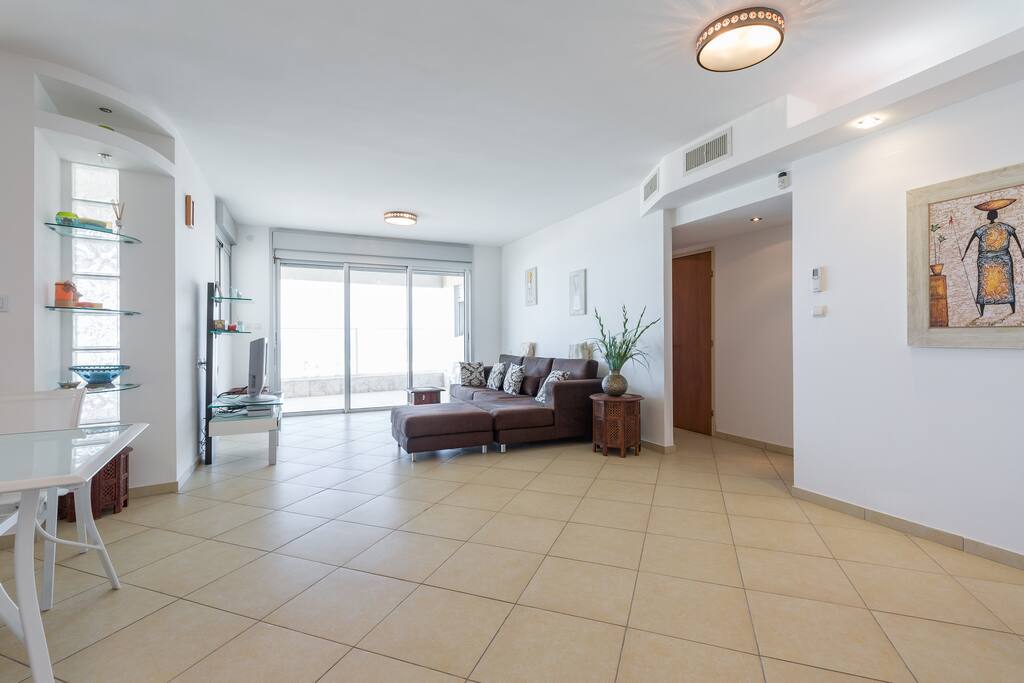 Large living room white a spectacular view off the beach