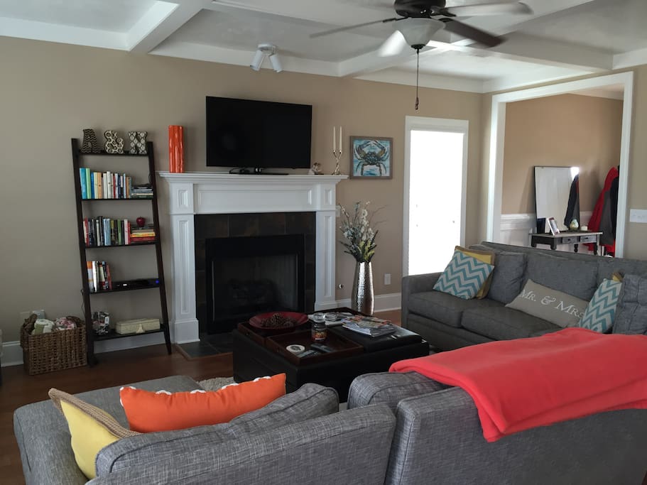 Living area with comfortable seating for gathering and 48" TV