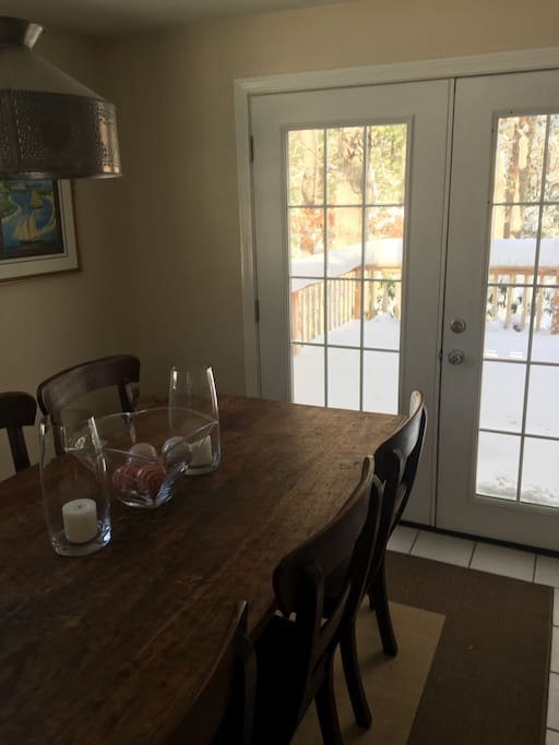 This is the dining room which overlooks private wooded yard...guests are free to enjoy.