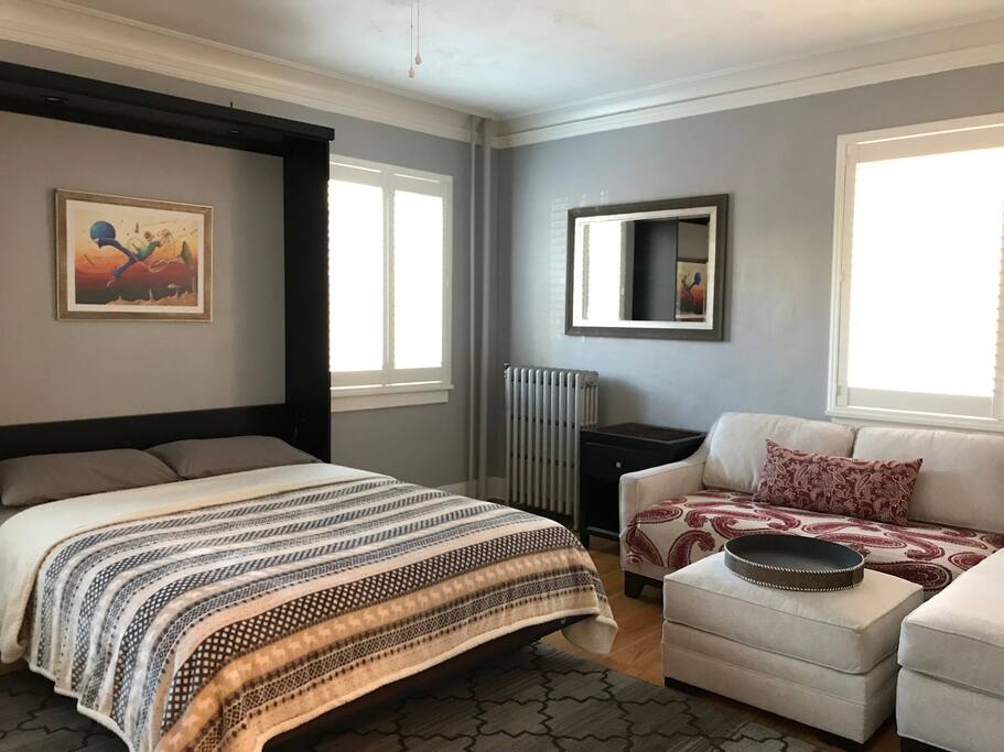 This is the living space with the queen murphy bed open.