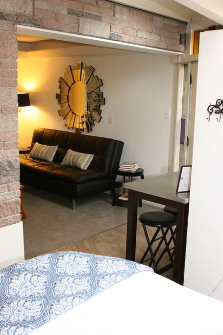 View of living area with fold down couch