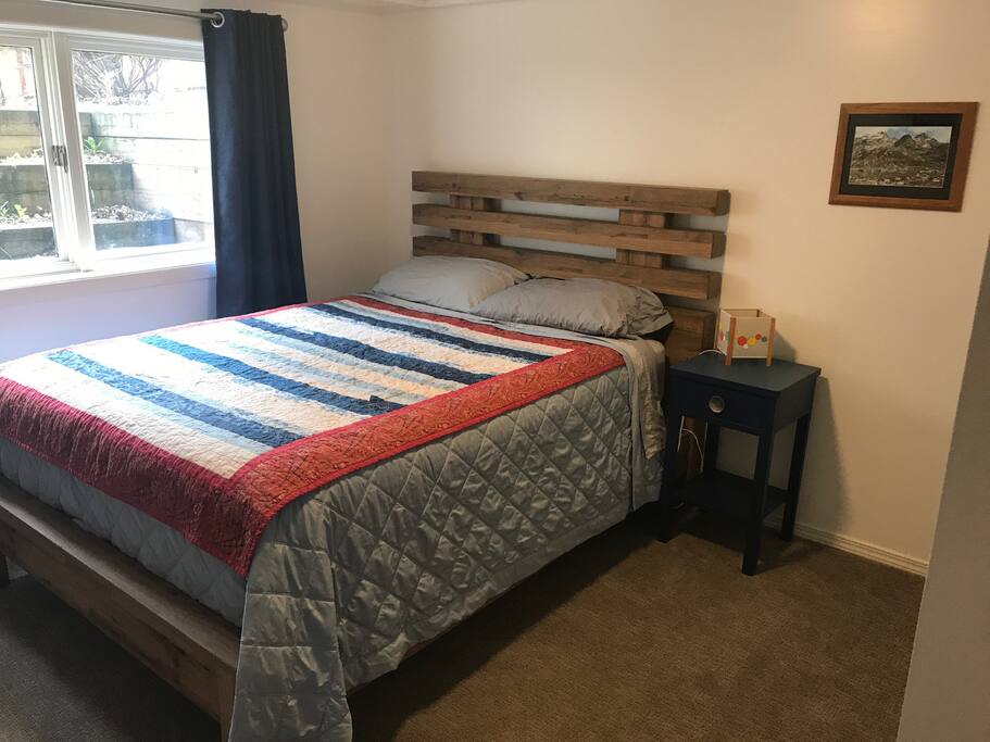 Bedroom #1 with Queen size bed, dresser and closet space.