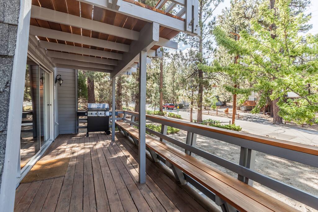 Front deck off of living room with bbq