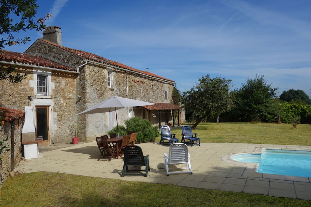 Back Garden - Swimming Pool, patio, barbecue, sun loungers, table and chairs