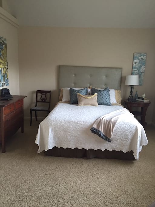 Queen size bed. Please note: our guest suite is on the second floor of our town house. Two flights of stairs are necessary for access.