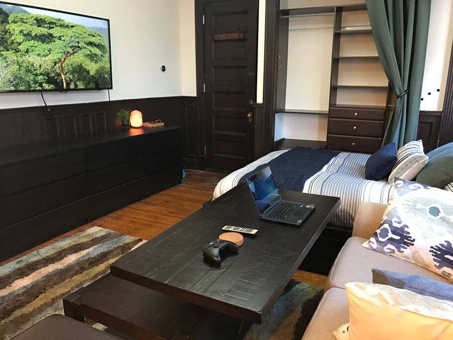 The coffee tables doubles as a desk and space to eat.