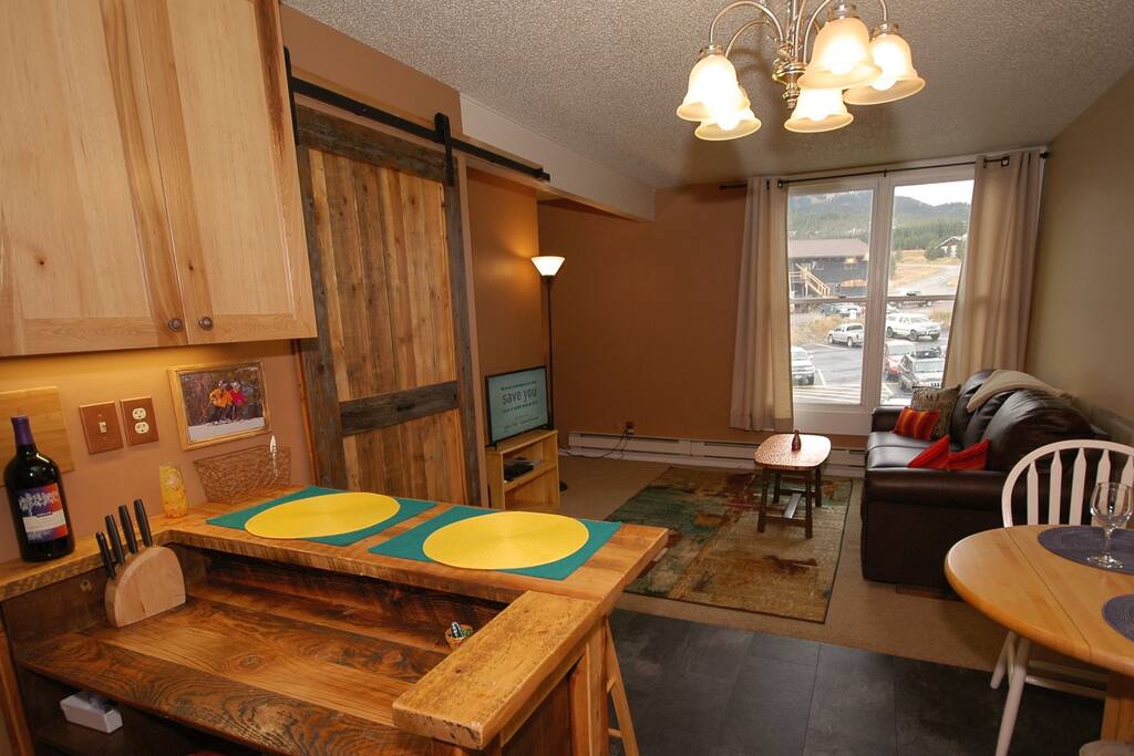 Open floor plan yet privacy with the bedroom being separated by a wall.