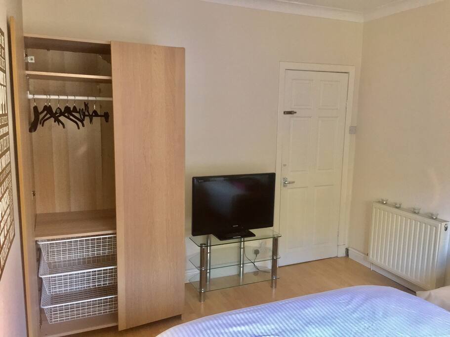 Wardrobe and Tv for guest use
