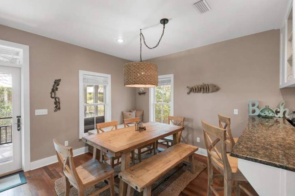 For more formal meals, the farmhouse style table comfortably accommodates 6.