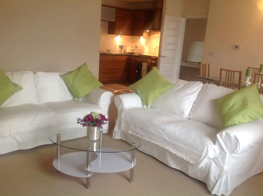 There is open plan living/dining/kitchen. The offset kitchen is well equipped.