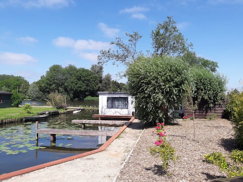 Houseboat on the river Vecht in Nederhorst den Berg