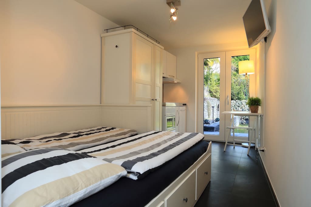 Schlaffzimmer/Küche/Essbereich