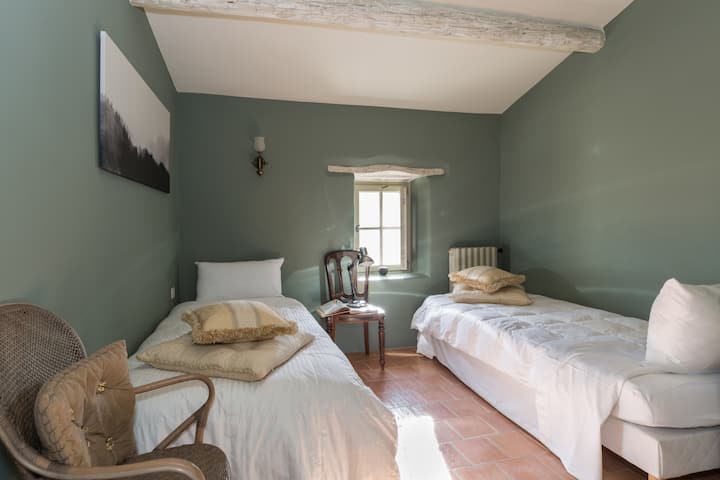 Bedroom 4 with two single beds with a built-in closet (south facing). Two single beds can be converted into a super king on request.
