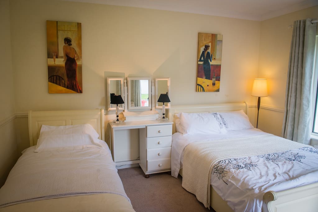 Guest bedroom with single and double bed