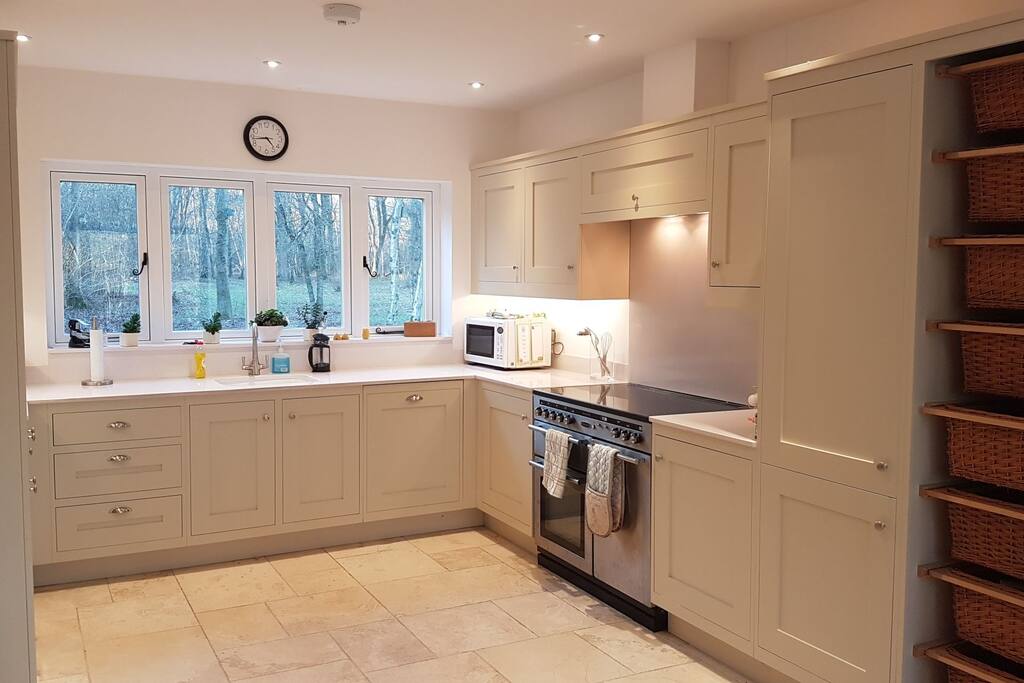 kitchen with dishwasher microwave fridge freezer. ect
