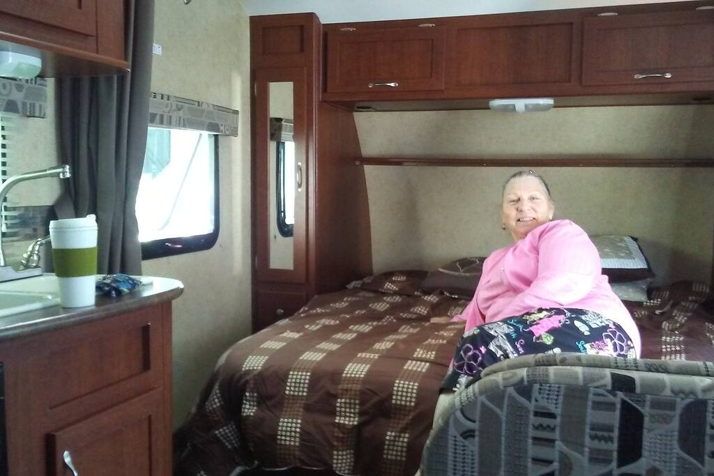 Storage: hanging cloths closet, drawers above, sides, also under the queen size bed.