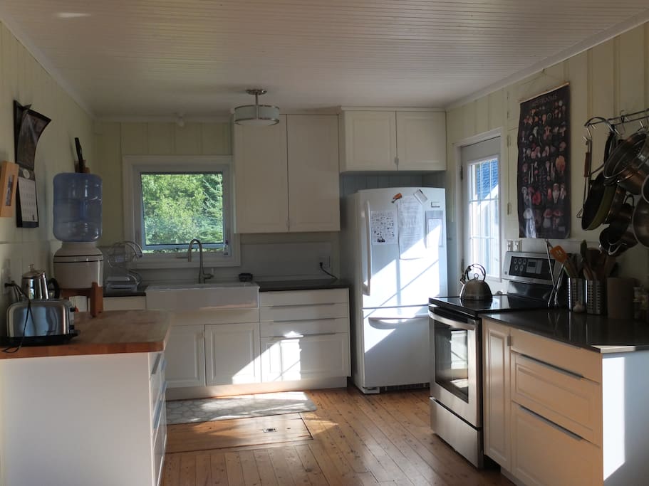 New kitchen with ceramic double sink and quartz counters
