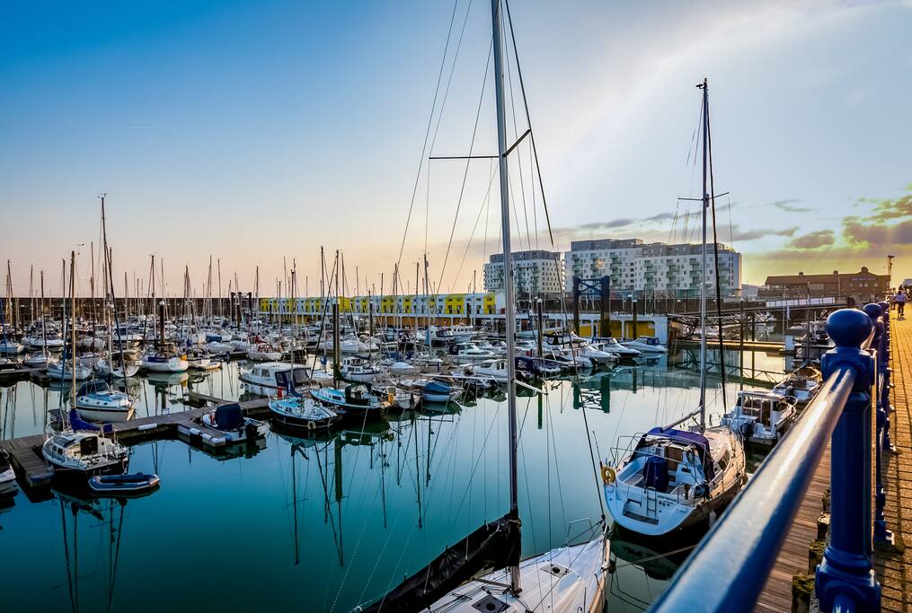 Brighton Marina at sunset, with the Rethink Living apartments in the background