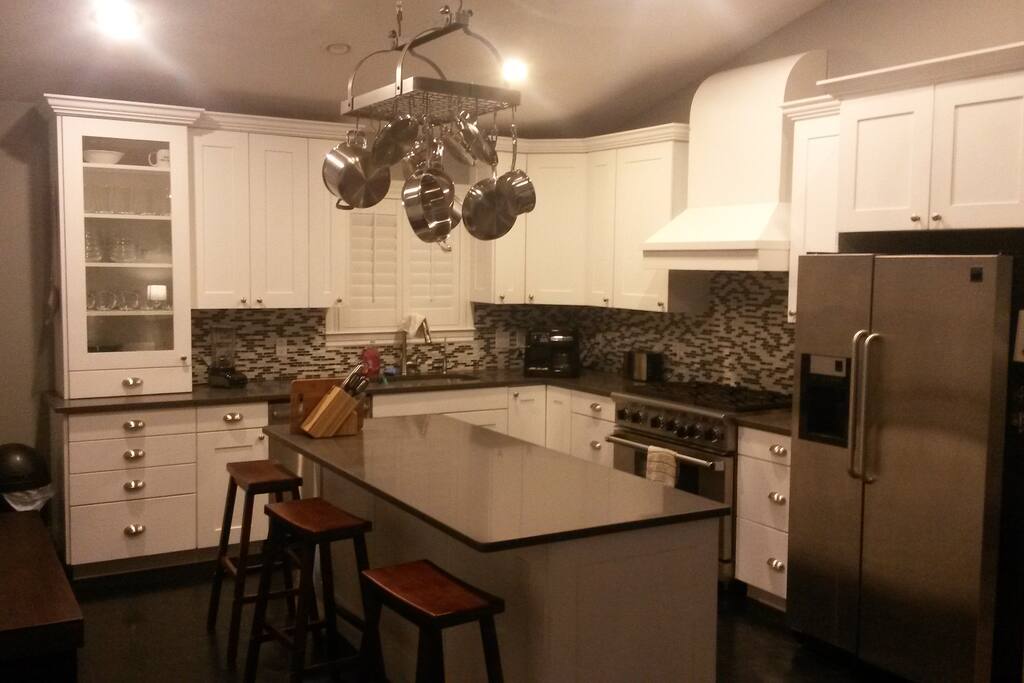 Custom kitchen with espresso machine.