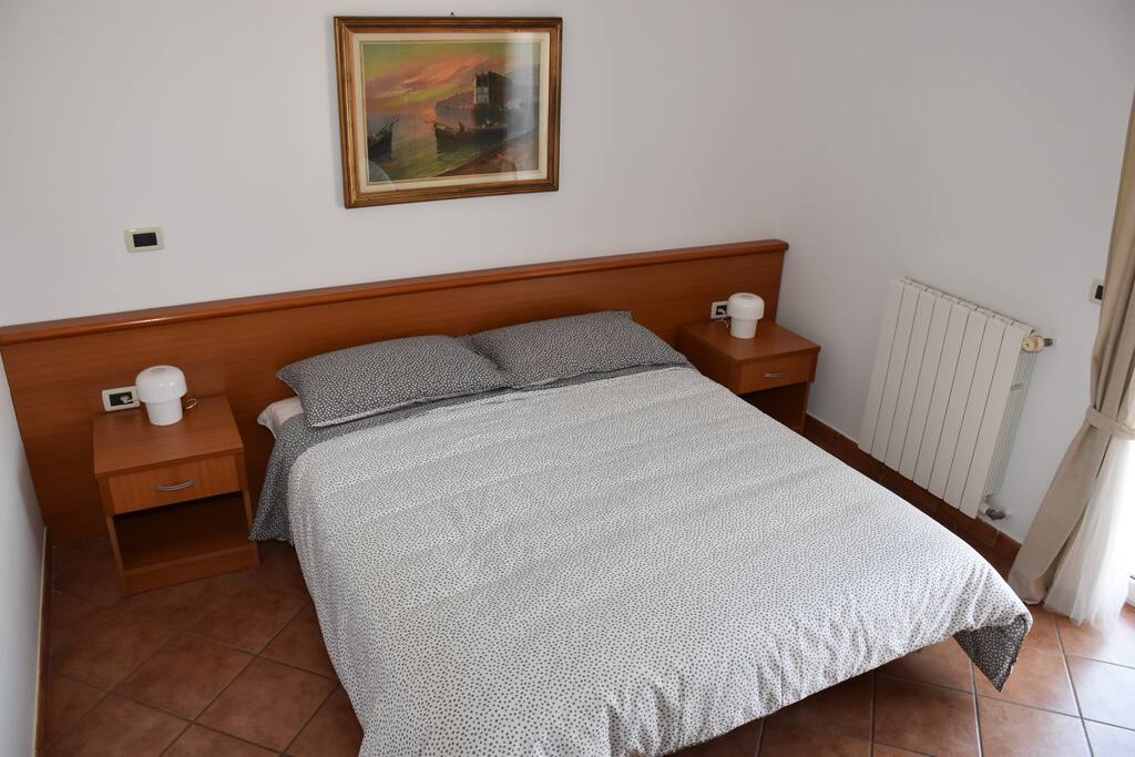 Second bedroom with king-size bed with AC.