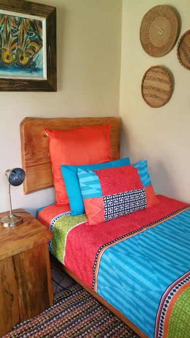 Third bedroom separate from the main house with a toilet and basin