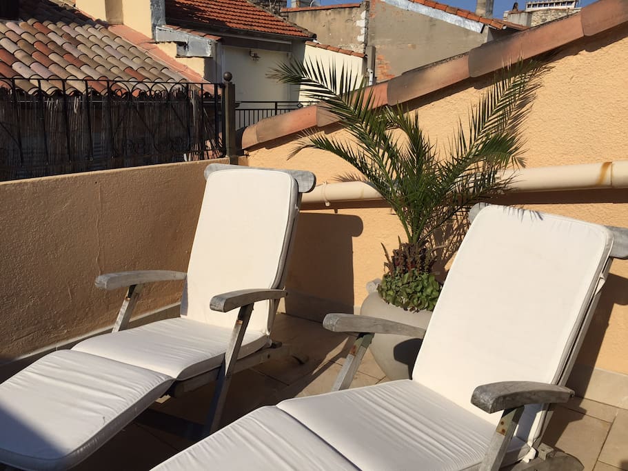 Comfortable teak deck chairs with new cushions