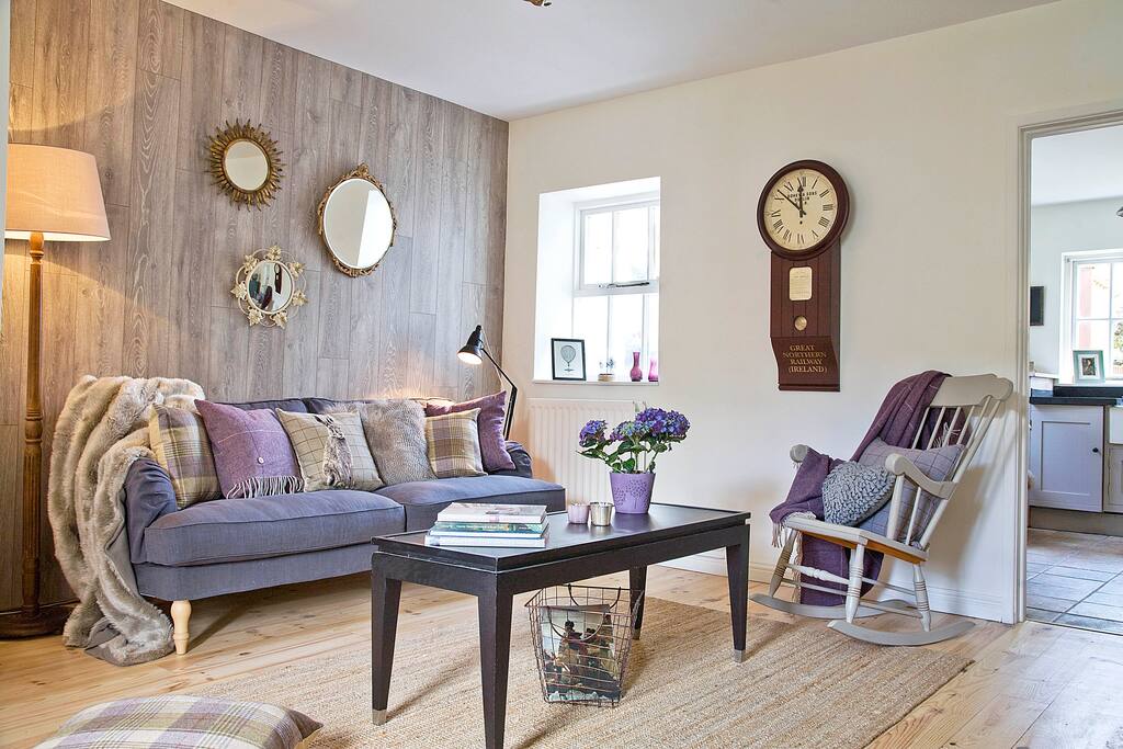 Spacious yet cosy living room with wood burning stove