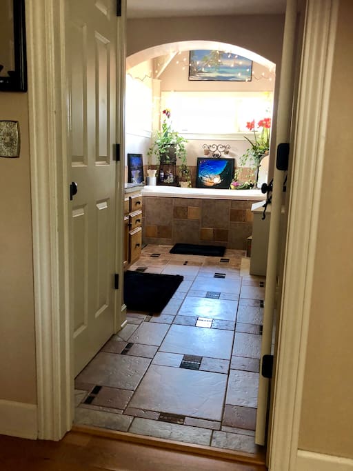 Hallway view of the bathroom at Conveniently Cozy Hang10 Pad.
