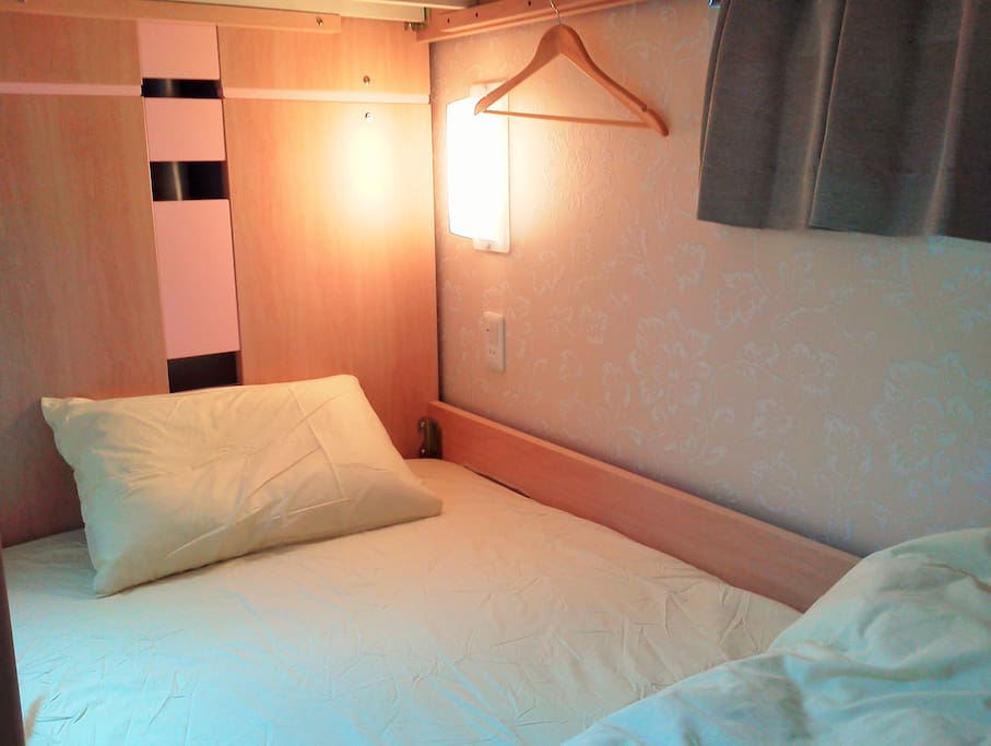Bed with a reading light.