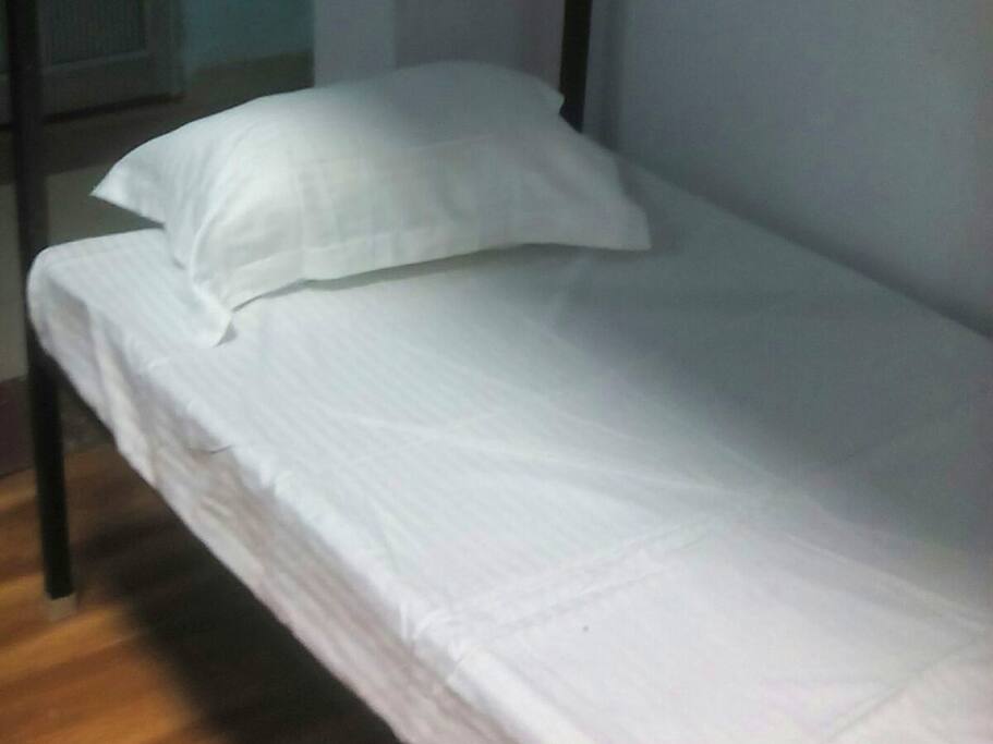 Cozy beds with same linens as a 5 star would use