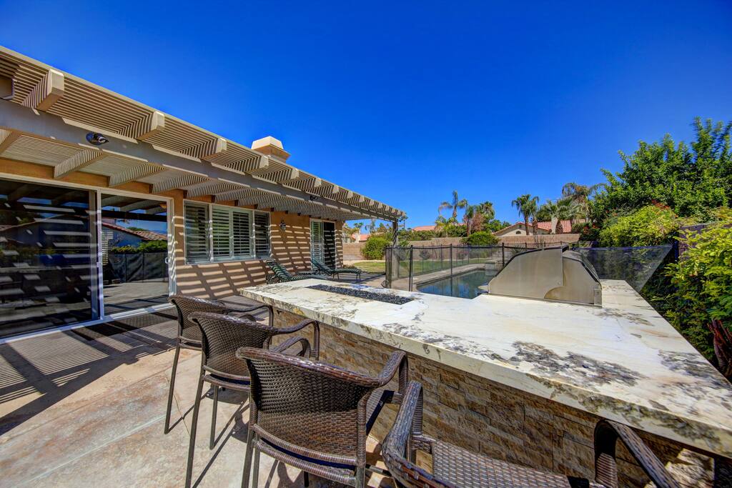 Relax by the fire pit with a glass of wine