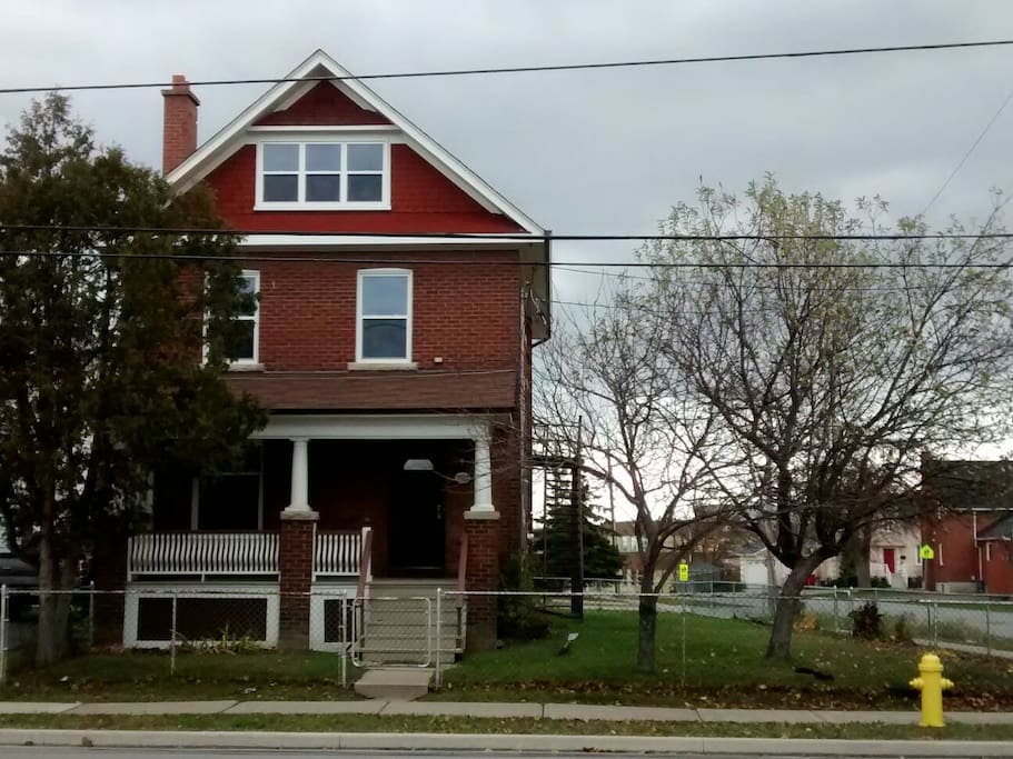 Rooms are on the second floor of this house which was first built in 1925. Totally rebuilt in 2013, it now features hardwood floors, lots of natural light, energy efficient windows and modern appliances.
