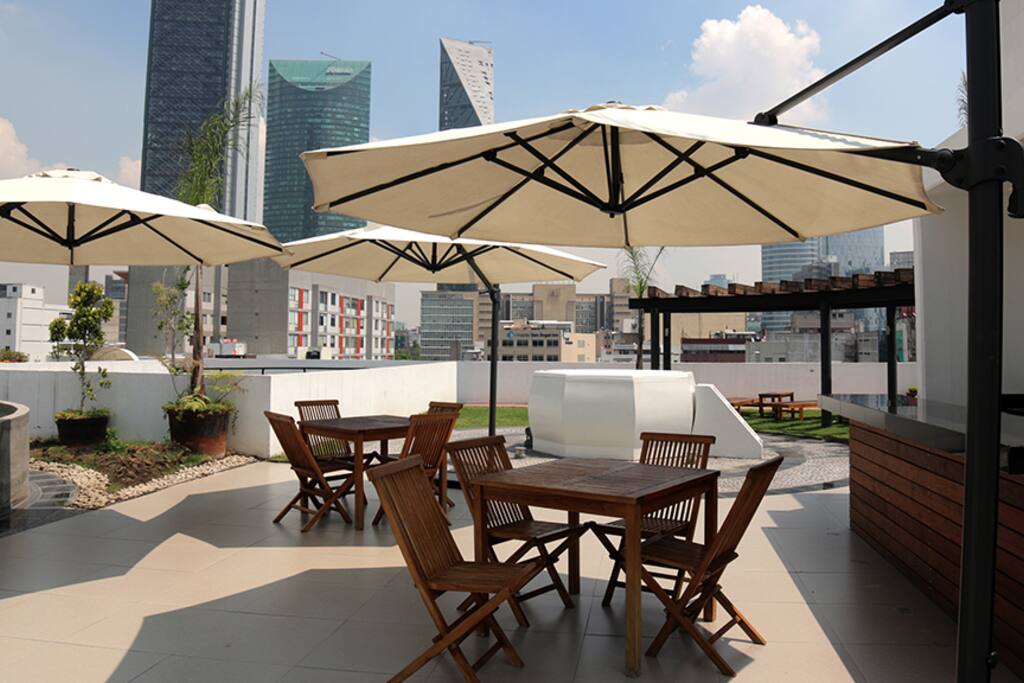 The Rooftop offers a view of the city's skyline and Chapultepec Castle