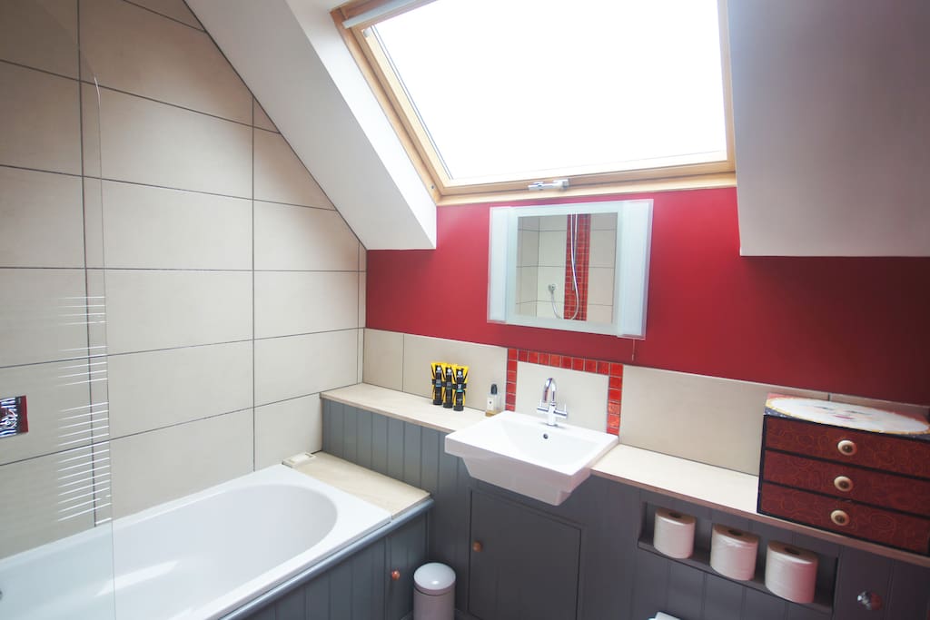 Gorgeous private bathroom shared between the two rooms.