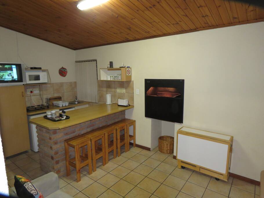 Lounge with kitchen and indoor barbeque