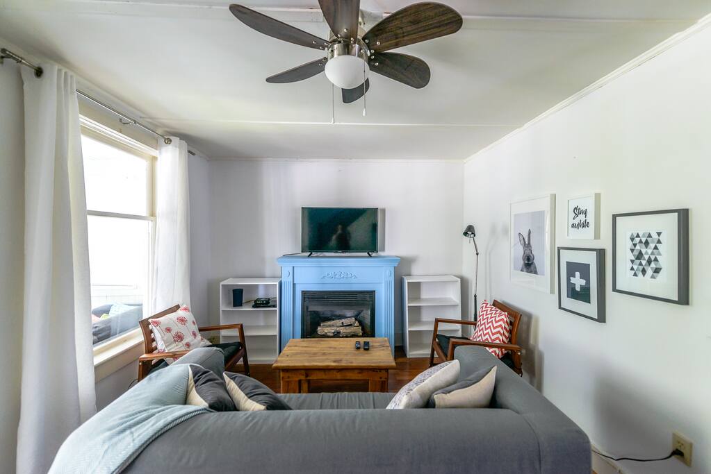 Living room has flat screen TV and gas fireplace for cooler evenings