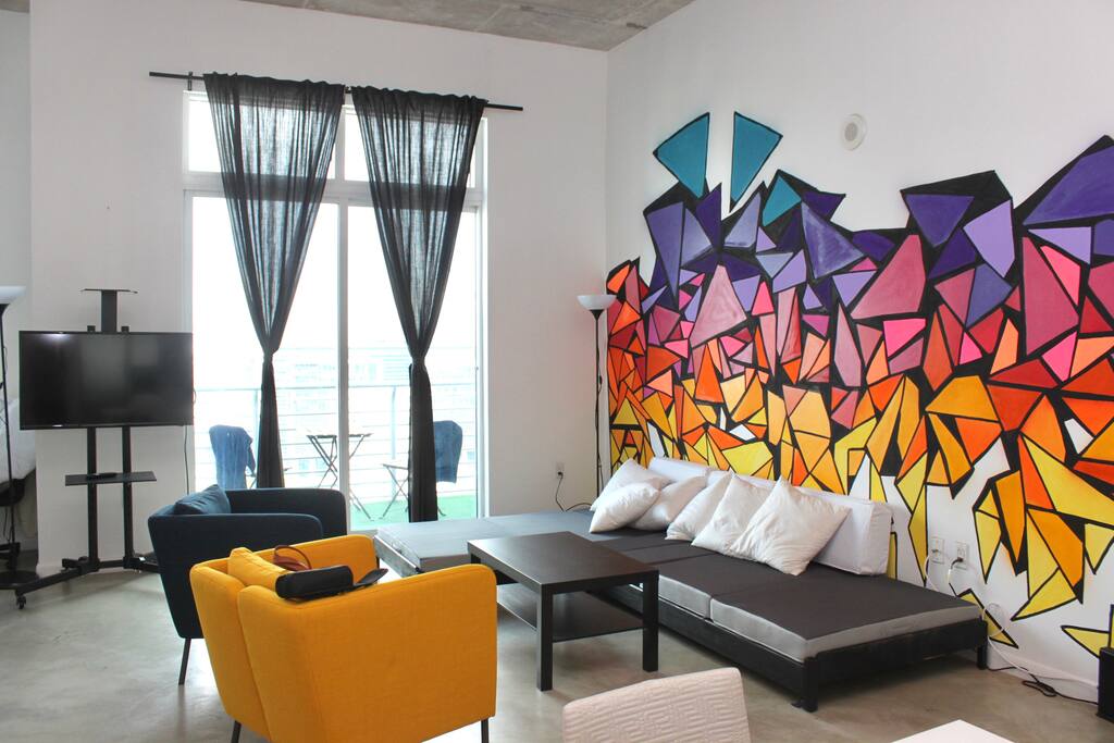 Hangout in our cool living room. Sofa can convert into 2 separate twin beds if needed.