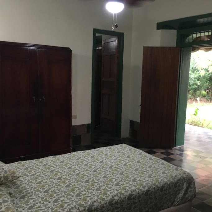 Doors to bathroom, garden, and main sala