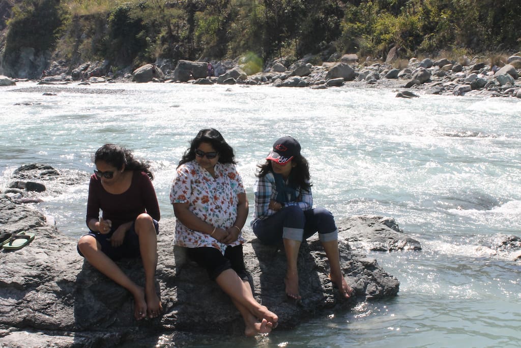 Guests enjoying on river side.