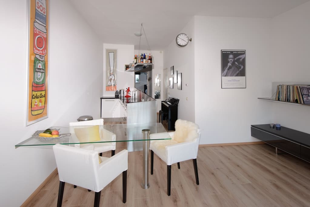 The living room with the kitchen