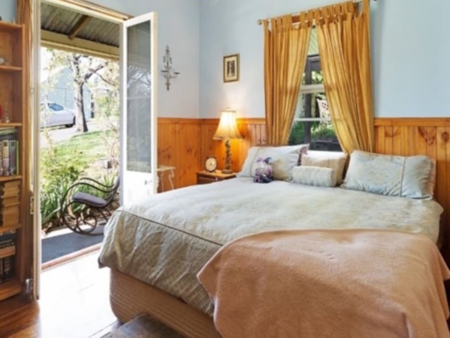 Front bedroom with French Doors opening onto verandah.