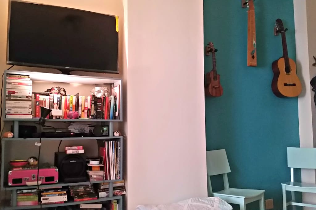 Our TV is a smart TV - we do not have a cable subscription but it is linked to YouTube, HBO Now, Amazon Video and Pandora. We also have an Amazon Echo Dot, so you can ask her to play some tunes while you get ready for NYC excursions! Next to this is a small nook which now houses a triangular breakfast table (not pictured) between the two chairs.