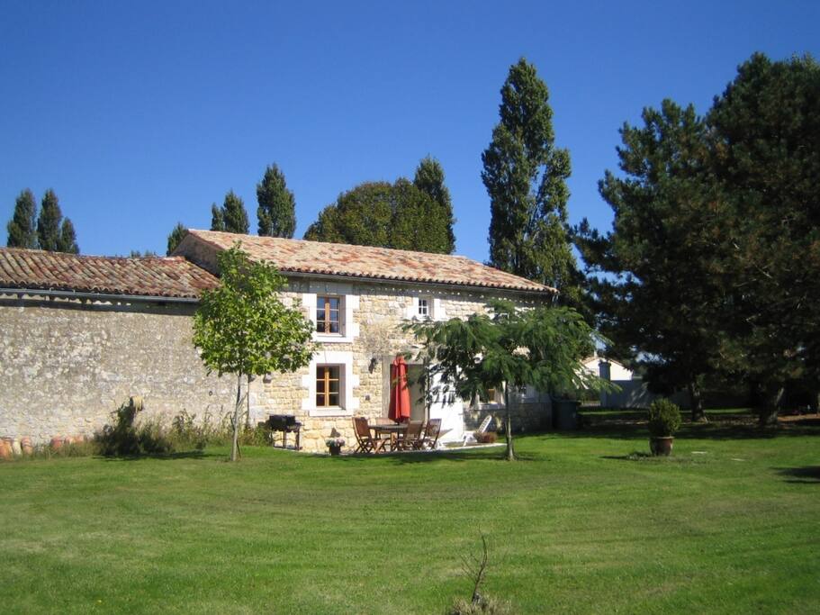 The Cottage with old stone barn adjacent.